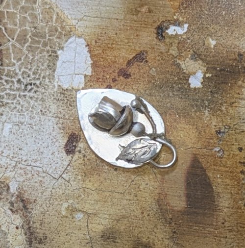 Judy Larson's Hearts and Flowers Charms - , Classic Wire Jewelry, Cutting, Cutting Tool, Cutters, Filing, Finishing, Butane Torch, Soldering, Solder, Design, Shape a hanging loop with the flower stem.